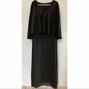 Maxi length formal gown with cape overlay.